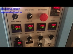 Normal heater Paper cup machine with robort arm testing running 7OZ for Cyprus client